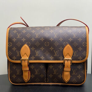 Louis Vuitton Monogram Double-Buckle Messenger Bag — Detail View 1 Louis Vuitton Monogram Double-Buckle Messenger Bag detail view 1