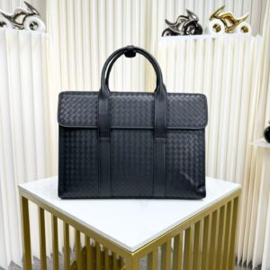 Black woven leather handbag