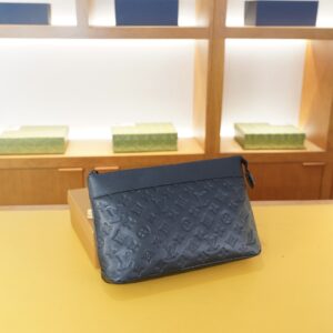 Black embossed monogram clutch